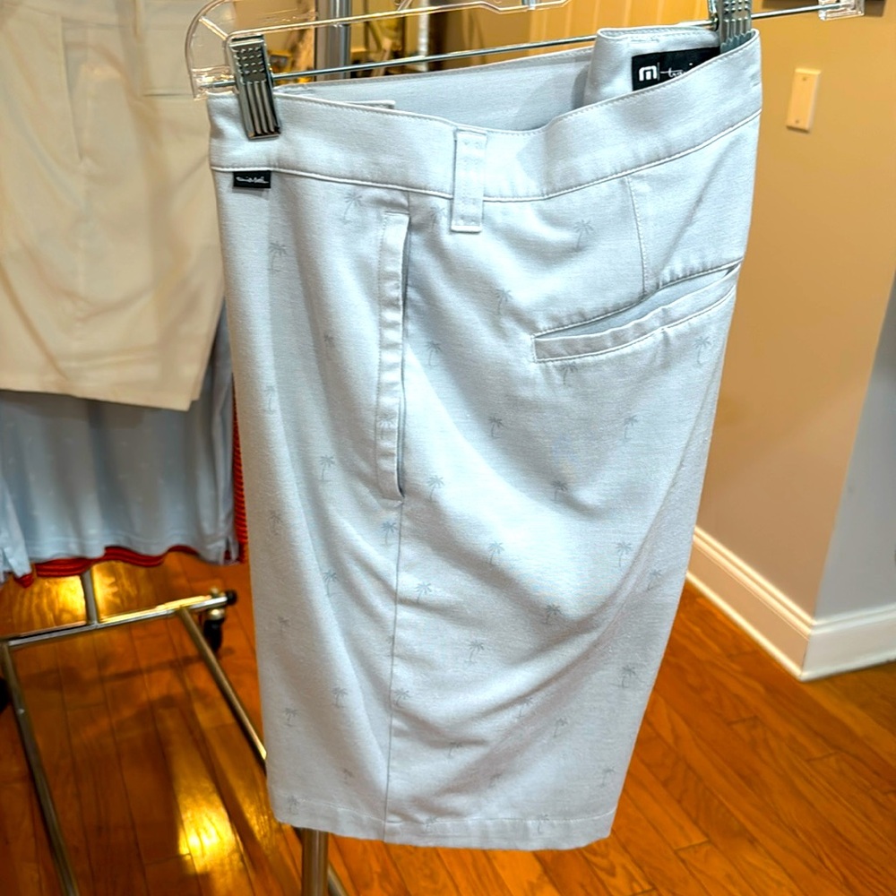 Travis Matthew’s golf shorts. Light grey with charcoal palm trees print size 36